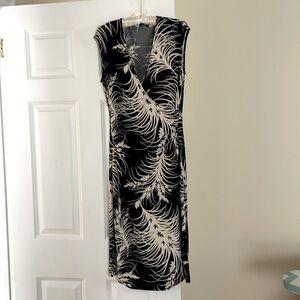 BCBG mid calf black and off white dress. Size Medium